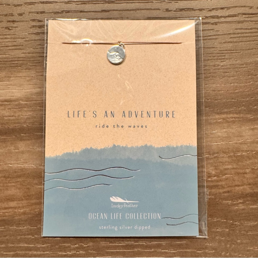 Lucky Feather - Ocean Life Necklace - Waves - Silver
New in package
